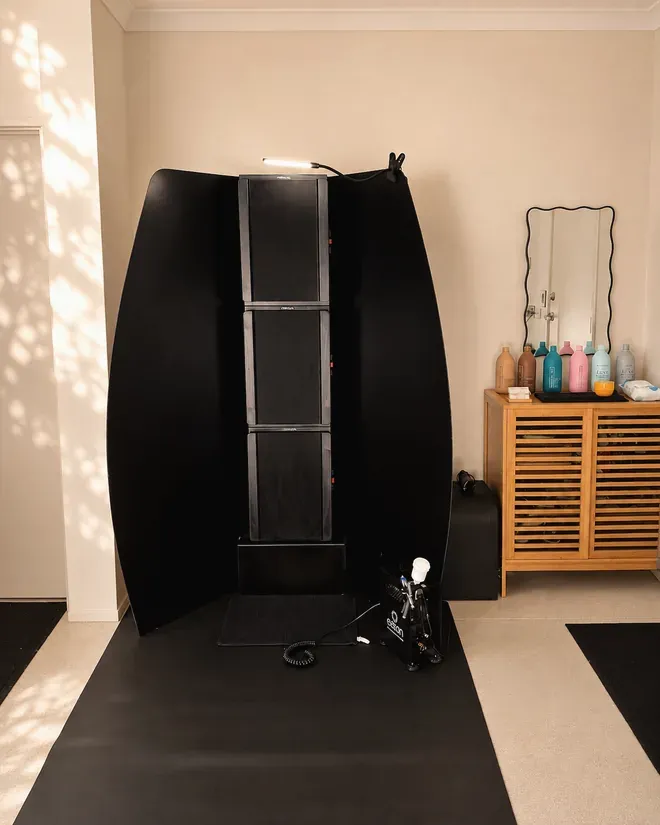 The spray tan booth and product station in the Secret Tanning Co home studio, Secret Harbour